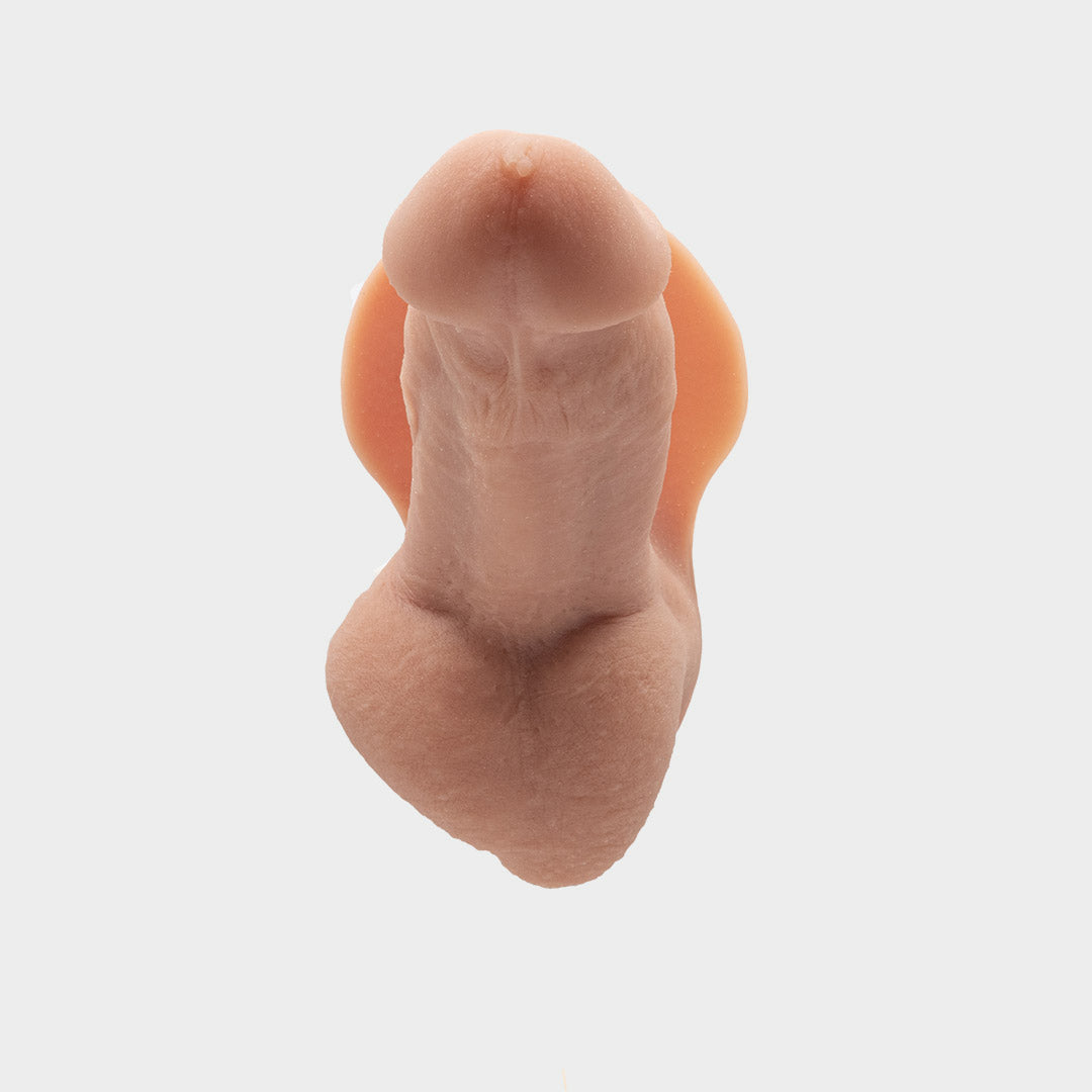 A realistic hard penis play prosthetic with veins and realistic skin features. Brand Banana Prosthetics.
