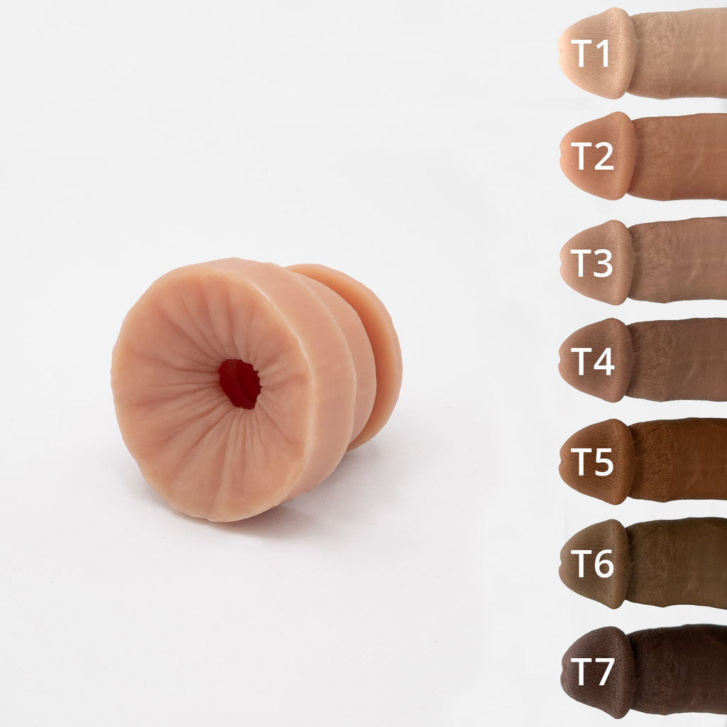 Anus sensation plug of the hard penis packer HP1 banana prosthetics. 7 different skin tones.
