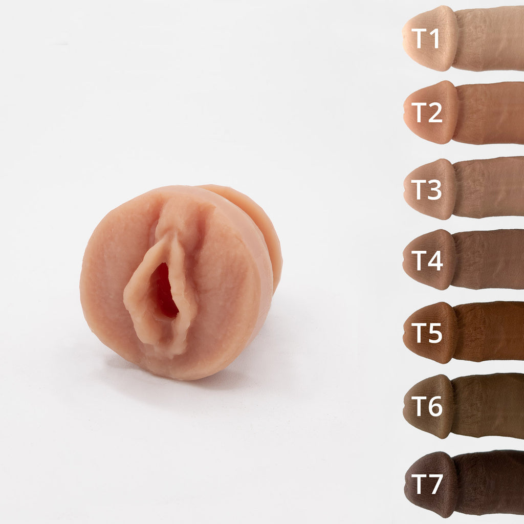 Sensation plug featuring a vulva for banana prosthetics hard play penis. 7 skin tones.