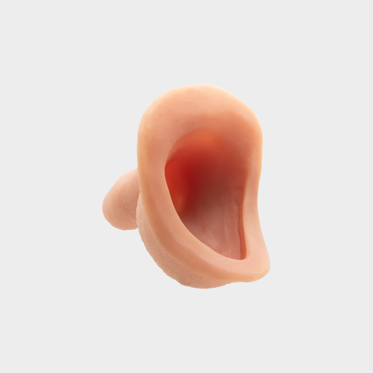 Back and side view of banana prosthetics Stand to Pee made of silicone.