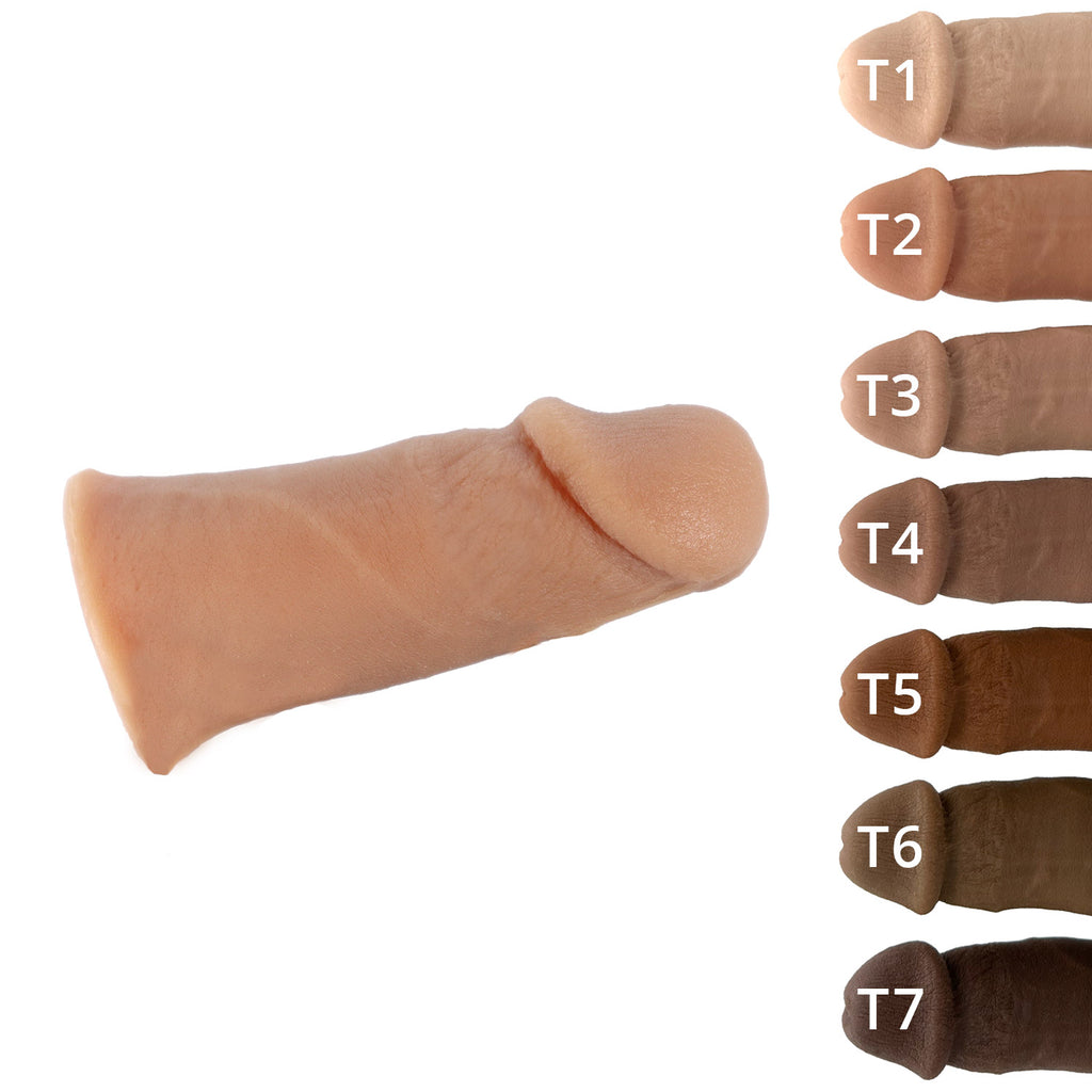A realistic Banana Prosthetics stroker, penis like silicone masturbator device for trans man, trans masc, ftm, and people with bottom growth. 7 skin tones. Side.