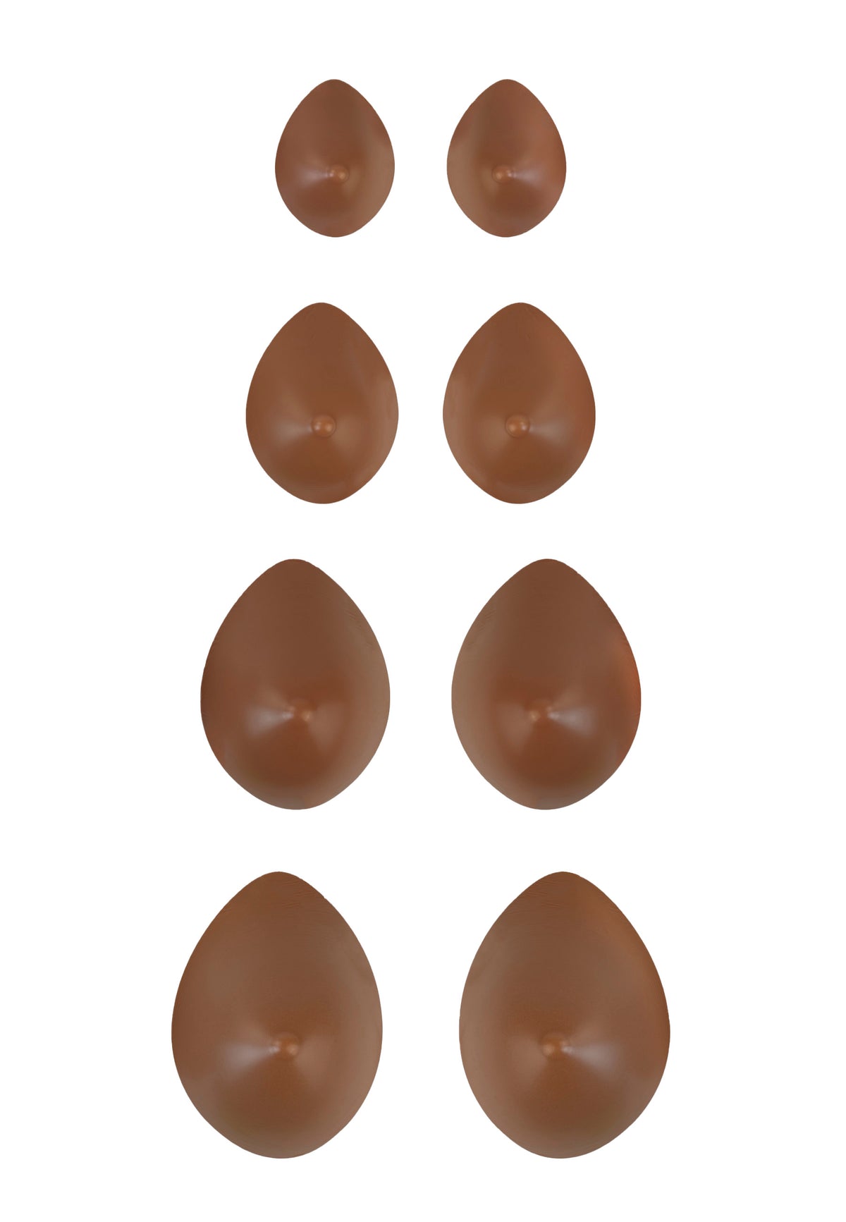 Breast forms or silicone realistic breast prostheses for trans women, mtf, drag queens, cosplayers. Caramel color. 4 sizes from A to D cup. Oval shape. Pair view.
