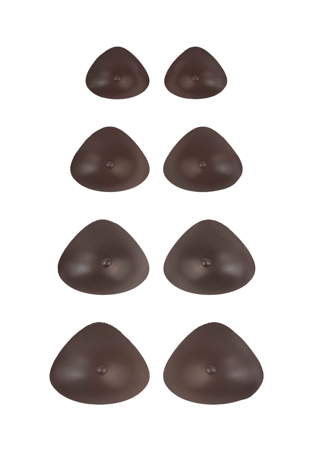 Breast forms or silicone realistic breast prostheses for trans women, mtf, drag queens, cosplayers. Dark chocolate color. 4 sizes from A to D cup. Triangular.