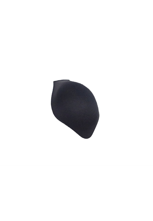A packer made of foam. It has penis outline shape. It can be used with or without packing boxers. Made for ftm, trans masc, nonbinary, trans men, drag queens, cosplayers. Top view.